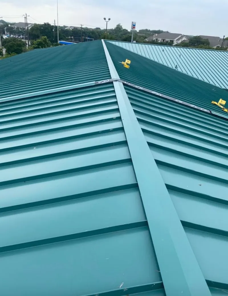 Green commercial metal roof ridge and valley for Metal Roof Repair in Drexel Heights